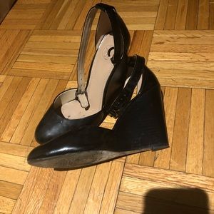 Black Tory Burch wedge shoes.